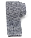 A shimmering tie with a retro cut and skinny width offsets your shirting with panache for a fetching overall look.