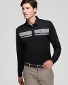 This high-performance polo is ideal for an early morning round when the sun hasn't quite warmed up the course. An authentic and handsome design from Travis Mathew.