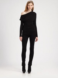 This ultra-soft jersey top has a draped asymmetrical neckline and vibe that's eternally effortless. Asymmetrical necklineLong sleeves94% rayon/6% spandexDry cleanMade in USA of imported fabricModel shown is 5'10 (177cm) wearing US size Small.This style runs small. We recommend ordering one size up for a standard fit. 