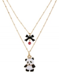 Animal magnetism. Pandas are always hard to resist, and Betsey Johnson puts a charming one front and center in this two-row necklace. Crafted from antique gold-tone mixed metal, the necklace also features a black bow and other sparkling accents. Item comes packaged in a signature Betsey Johnson Gift Box. Approximate length: 16 inches + 3-inch extender. Approximate drop: 2-3/4 inches.