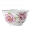 Grow your garden. The Butterfly Meadow Bloom bowl from Lenox features the sturdy, scalloped porcelain of original Butterfly Meadow dinnerware but with fresh pink and violet blossoms.