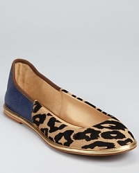 DIANE von FURSTENBERG fuses the espadrille and ballet flat with the unique Botswana shoe, crafted in luxe leopard printed pony hair and rich leather.