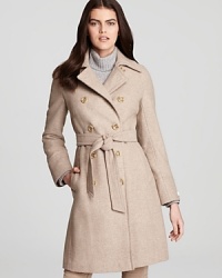 This classic yet modern Calvin Klein coat is a great wardrobe staple. The traditional double breasted construction and optional belt are just the type of details you'll adore season after season.