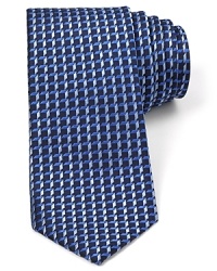 Add some 3D flair to your office attire with this handsome tie featuring an allover pattern of tonal cubes.