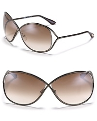 Add a modern element to your beach ensemble with Tom Ford's crossover metal sunglasses.