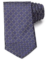 The pattern of this lavish silk tie from Canali creates depth and dimension to your professional attire, perfect for a major office presentation.