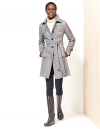 You'll hope for blustery days with DKNY's trench coat. The quilted construction adds a unique touch to this classic silhouette.