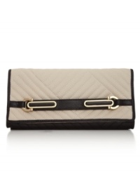 Sized-right for chic soirees or low-key luncheons, this Calvin Klien clutch really works the room. With luxe quilted leather, discrete detailing and sleek shape, it's the perfect understated accessory.