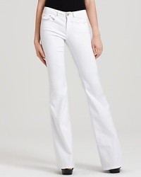 These Rachel Zoe flare-leg jeans prove white isn't just for summer and '70s-inspired style is having a moment. Work the look to the hilt: a silk tie-neck blouse and towering platforms should complete with retro cool.