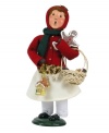 Start every holiday season on a sweet note. This young lady is bundled tight, caroling door to door and delivering yummy treats with the rest of the Gingerbread Family figurines, all handcrafted by Byers' Choice.