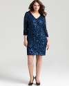 This Aidan Mattox dress boasts two of the season's most covetable trends: classic long sleeves and brilliant sequins.