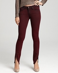 An unexpected tulip slit hem lends a unique and uber-chic look to these Rich & Skinny jeans updated in a deep, colorful wash.