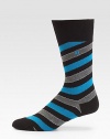 Add a dose of colorful energy to your professional attire with these comfortable, striped cotton-blend socks.Mid-calf height74% cotton/24% polyamide/2% elastaneMachine washImported