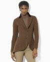 Rendered in hearty wool tweed, a chic two-button jacket is steeped in equestrian inspiration.