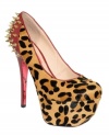 Take the high road to fierce fashion with this sky high style from Betsey Johnson. Leopard-printed calf halr and a sassy spiked heel are sure to get you noticed.