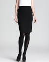 A careerist essential, a classic Elie Tahari pencil skirt lends sharp edge to your 9-to-5 style routine.