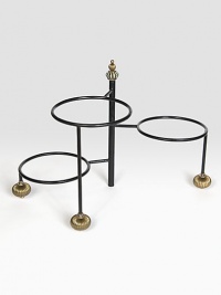 An elegant way to stack buffet plates or present serving bowls, crafted of hand-forged steel so each piece may vary slightly. Forged steel and brass Hand-painted finial 16¼H X 13½W Wipe clean Imported 