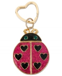 The love bug. This ladybug key chain from Betsey Johnson is crafted from antique gold-tone mixed metal with fuchsia glitter and green glass crystal accents for a whimsical touch. Item comes packaged in a signature Betsey Johnson Gift Box. Approximate drop: 4 inches.