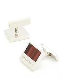 The natural allure of the gemstone partners with polished brass on this distinctive cufflink, which also features an engraved logo along the square outer frame for a powerful finish to your French cuff.