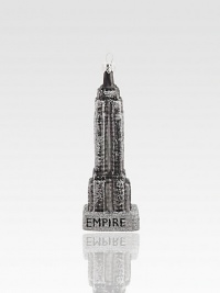 The iconic form of New York's Empire State Building appears to be dusted with sugar in this glittering glass creation to hang on your tree.Handmade and hand-paintedGlassAbout 6.5H X 1.5W X 1.25DImported