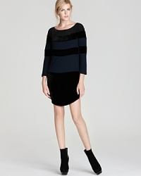 Bold and subtle at the same time, this casually sexy dress is embellished with colorblocked velvet stripes and a rounded hem - a great option for a creative office. Add ankle boots and punch the clock.