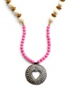 Open your heart. Strung with wooden beads and a hand-cut and hammered pendant, this Heart of Haiti necklace is crafted by a co-op that supports women's employment in local communities.