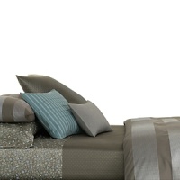 This pillow adds a metal-hued note of cool to your bed. It has a combed cotton cover for a soft touch.