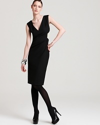 A plunging neckline and revealing cutouts inject this Rachel Roy dress with a dose of provocative edge. Tame the modern silhouette with chic tights for effortless sophistication.