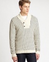 Two-button pullover sweater captures the essence of seasonal style with an allover nordic-inspired pattern. Shaped in a luxurious cotton blend, a shawl collar tops this wardrobe essential lending a touch of sophisticated charm.Shawl collarRibbed knit cuffs and hemCotton/acrylicDry cleanImported