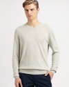 A touch of cashmere lends luxurious softness to this fine-knit pullover.V necklineLong sleevesRib-knit cuffs and hemAbout 30 from shoulder to hemSilk/cotton/cashmereHand washImported