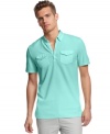 Chest pockets at a workshirt influence to this classically cool polo shirt from Calvin Klein.