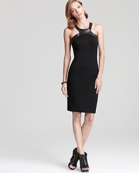 ABS by Allen Schwartz gets edgy with this racer back silhouette, trimmed in leather-like details for downtown chic.