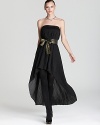 Be the life of the party in this KAS New York dress with an elegant high-low hem and flirty metallic belt.