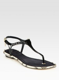 Patent leather sandal has satin lining, an adjustable slingback and snake-print leather trim. Patent leather and snake-print leather upperSatin liningLeather solePadded insoleImported