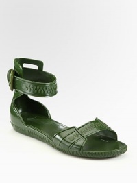 Casual-cool rubber style with an adjustable, wrap-around ankle strap. Rubber upperRubber solePadded insoleMade in ItalyOUR FIT MODEL RECOMMENDS ordering true whole size; ½ sizes should order the next whole size down 