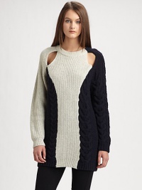 A modern and inventive take on the classic pullover, with unexpected shoulder cutouts, asymmetrical contrast panels and chunky cable-knit detailing.Ribbed crewneckLong sleeves with ribbed cuffsShoulder cutoutsContrast panelsRibbed hemAbout 31 from shoulder to hem66% wool/23% viscose/9% nylon/2% alpacaDry cleanImportedModel is 5'10 (177cm) wearing US size Small.OUR FIT MODEL RECOMMENDS ordering one size down as this style runs large. 