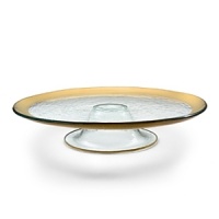 Ancient Italian relics are translated into an abstracted modern design in this handcrafted dinnerware and serving collection from designer Ann Morhauser. This handpainted, 24 karat gold collection tastefully accentuates everything from sleek, modern designs to delicate porcelain, or can be used on its own as a dramatic statement.