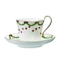 With its elegant depictions of pine garlands, red ribbons and traditional Christmas ornaments, Royal Copenhagen's fine bone-china serveware is the perfect backdrop to a joyous holiday celebration. A well-loved classic, the Star Fluted design was first produced in 1895.