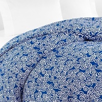 With a swirling pattern reminiscent of Asian woodcuts, this fresh DIANE von FURSTENBERG king duvet cover brings sunny charm to both modern and vintage-inspired decor.