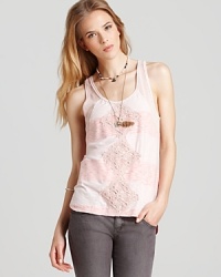 Dreams of lovely, effortless style become a reality with this Free People Dreamsicle tank, with embroidered detailing, sheer sides and a trend-right high/low hem.