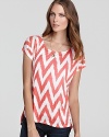 A must-have zigzag print and high/low hem bring this Ella Moss top alive with style.