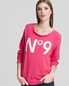 Boasting a chic No 9 graphic, this blissfully soft WILDFOX sweatshirt is a vibrant addition to your off-duty collection.