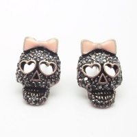 DaisyJewel Pretty Punk Love Glam: Top Seller Betsey Johnson Marcasite Slayer / Reaper Pink Enamel Bow and Black Crystal Encrusted Sugar Skull Calavera Stud Earrings with Heart Shaped Eyes - Skin-Safe Bronze & Gunmetal Alloy