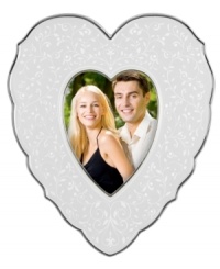 With the delicate vines, raised dots and platinum trim of the Lenox fine china collection, this Opal Innocence picture frame offers a look of classic elegance in a sweet heart shape.