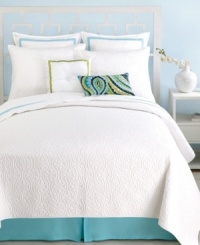 Reminiscent of the whitewashed architecture of the Greek island of Santorini, this Trina Turk coverlet features white-on-white quilted details for a clean, bright look.