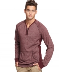 Drop some color into your cool with this zip front sweater from Bar III.