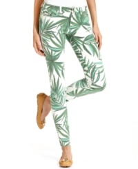 A striking palm print adorns these skinny jeans from MICHAEL Michael Kors.