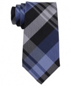 Playful plaid on this Kenneth Cole Reaction tie makes a modern statement against any classic cut.