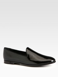 Classic slip-on style rendered in glossy Italian patent leather. Patent leather upperLeather lining and solePadded insoleMade in Italy