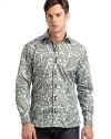 THE LOOKSpirited Euro stylingBright paisley print on crisp poplinSignature square buttonsSpread collar with single button at backLong sleeves with button cuffsRibbon trim inside collar, placket and at cuff placketContrast embroidered logo at back yokeTHE MATERIALCottonCARE & ORIGINMachine washImported